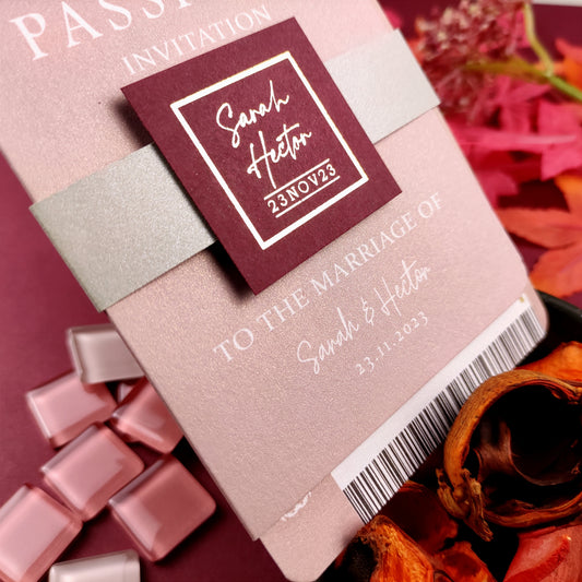 Luxury wedding invitations in peach passport boarding pass