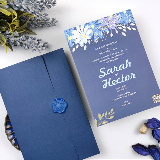 garden themed royal blue wedding invitation cards with matching personalised envelopes