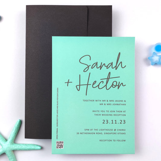 turquoise wedding invitation with black envelopes
