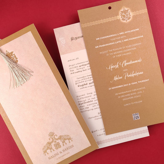 Traditional Indian wedding invitation cards in crepe pink